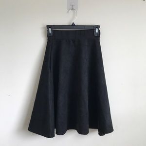 women’s black midi skirt